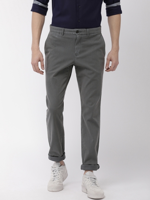 

Tommy Hilfiger Men Grey Slim Fit Self-Design Trousers