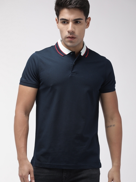 

Tommy Hilfiger Men Navy Blue Solid Polo Collar T-shirt