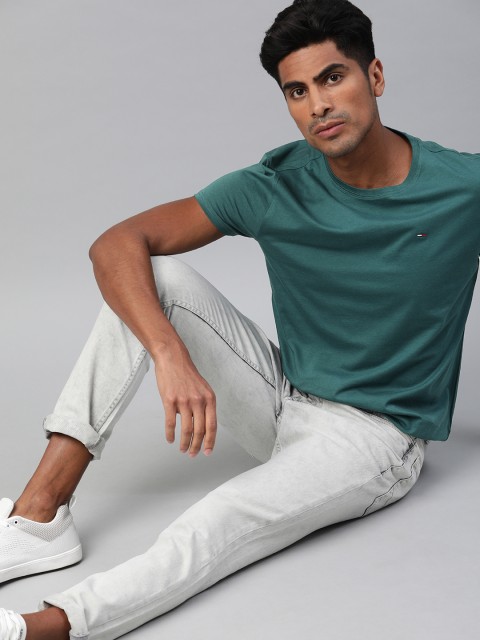 

Tommy Hilfiger Men Teal Green Solid Round Neck T-shirt