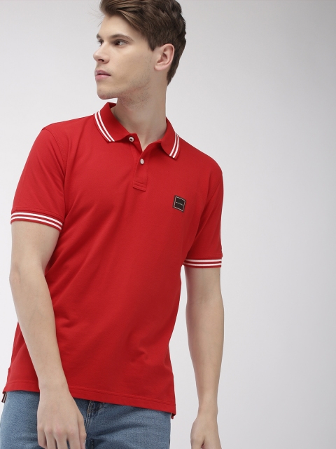 

Tommy Hilfiger Men Red Solid Polo Collar T-shirt