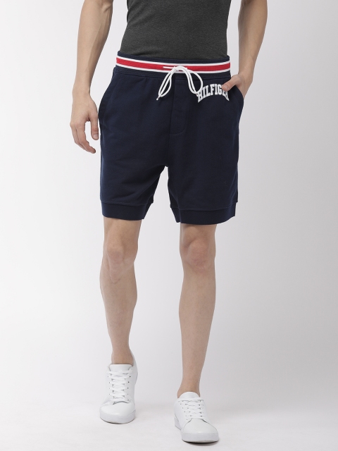 

Tommy Hilfiger x University Men Navy Blue Solid Regular Fit Regular Shorts