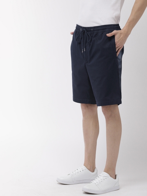 

Tommy Hilfiger Men Navy Blue Solid Regular Fit Regular Shorts