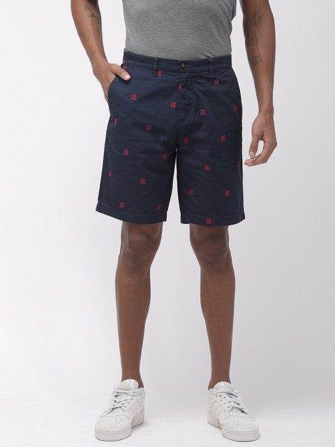 

Tommy Hilfiger Men Navy Blue Varsity Embroidered Regular Fit Regular Shorts