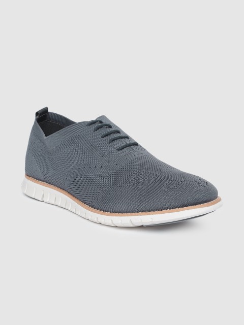 

Peter England Men Grey Sneakers