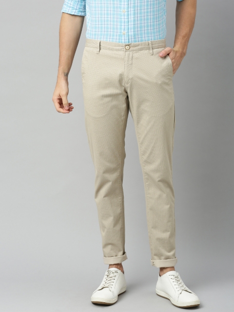 

U.S. Polo Assn. Men Beige Slim Fit Solid Regular Trousers