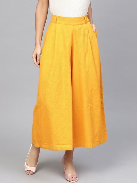

Jaipur Kurti Women Mustard Solid Flared Palazzos