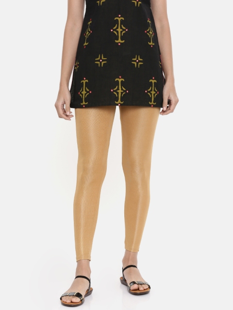 

Global Desi Women Gold Solid Leggings