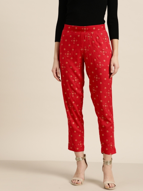 

Sangria Women Red & Golden Regular Fit Printed Cropped Trousers