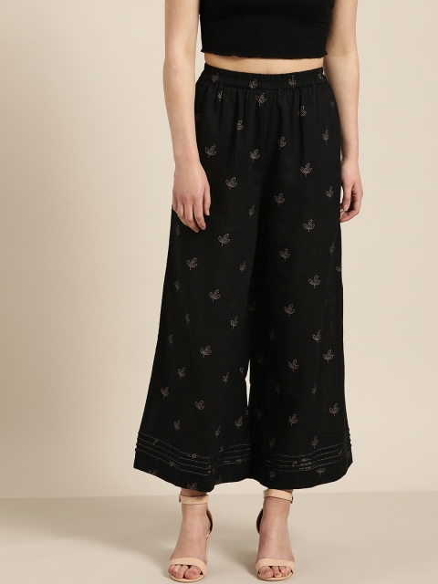 

Sangria Women Black & Golden Printed Wide Leg Palazzos
