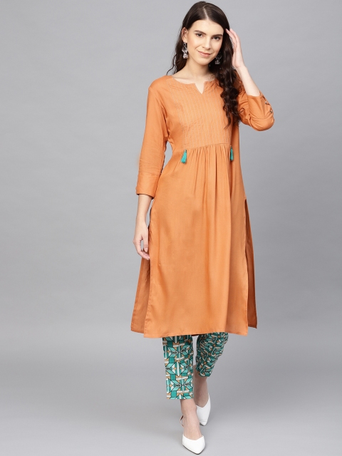 

Yufta Women Rust Orange & Sea Green Solid Kurta with Palazzos
