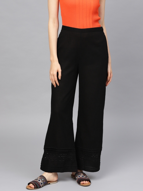 

Rain & Rainbow Women Black Solid Straight Palazzos