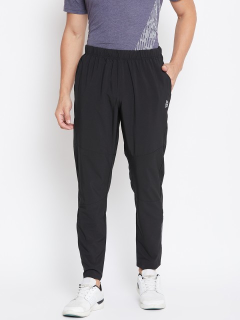 

Reebok Men Black Solid One Series Running Trackpants