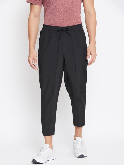 

Reebok Men Black Solid Workout Woven Cropped Training Pants