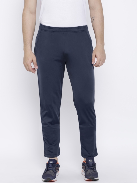 

Reebok Men Navy Solid TRICO Track Pants, Navy blue