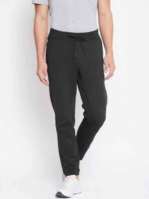

Reebok Men Black Self Striped Workout Ready Fleece Training Pants