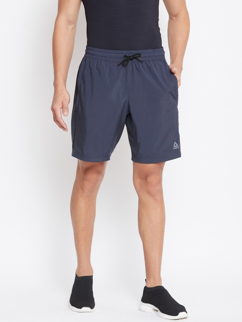 

Reebok Men Navy Blue Solid Workout Ready Woven Training Shorts