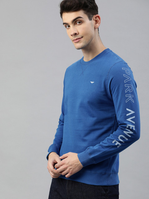 

Park Avenue Men Blue Solid Slim Fit Pullover Sweatshirt With Print Detail