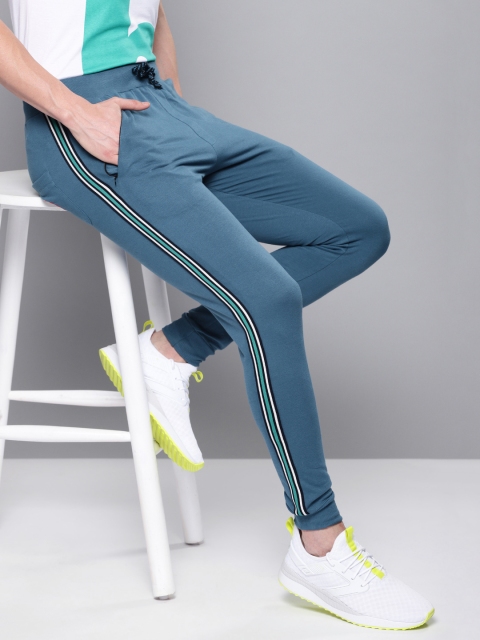 

Difference of Opinion Men Teal Blue Solid Slim-Fit Joggers