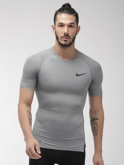 

Nike Men Grey Solid Round Neck AS M NP DRI-FIT SS TIGHT T-shirt