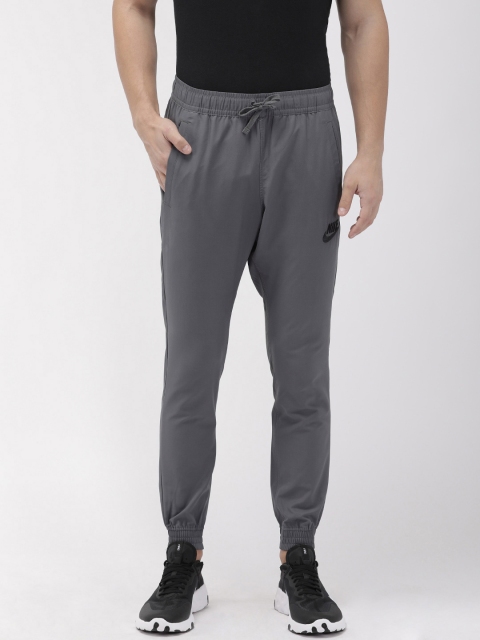 

Nike Men Grey Solid AS M NSW PLAYRS WVN NFS Slim Fit Joggers