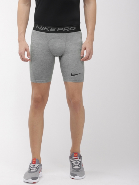 

Nike Men Grey Solid Regular Fit Sports NP Dri-FIT Shorts