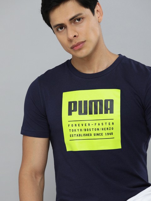 

Puma Men Blue Lime Green Printed Pure Cotton T-shirt