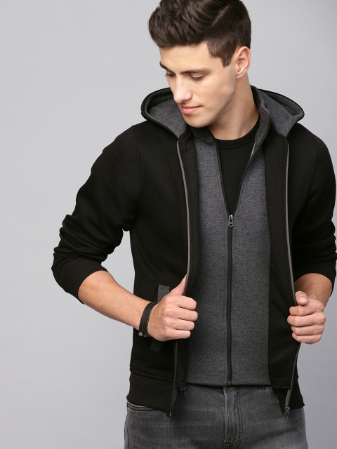 

Seven Rocks Men Black Solid Hooded Sweatshirt