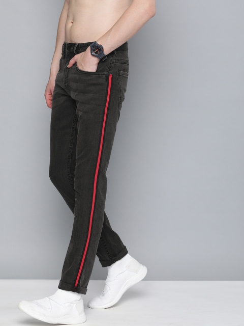 

HERE&NOW Men Black Skinny Fit Mid-Rise Clean Look Stretchable Jeans With Side Stripes