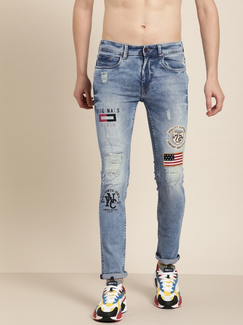 

Moda Rapido Men Blue Slim Fit Mid-Rise Mildly Distressed Stretchable Jeans with Applique