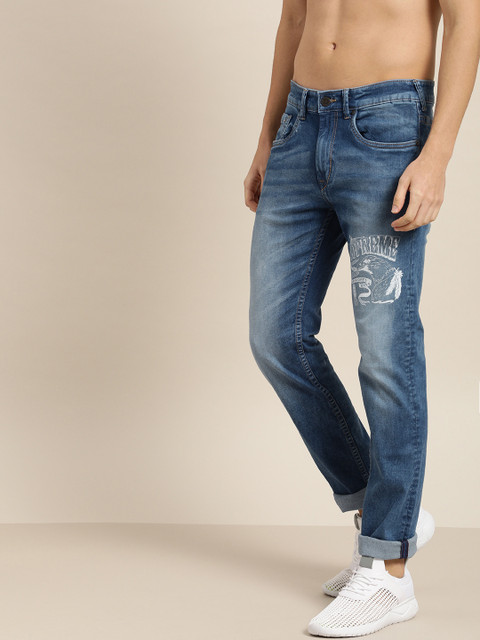 

Moda Rapido Men Blue Slim Fit Mid-Rise Clean Look Stretchable Jeans with Printed Detailing