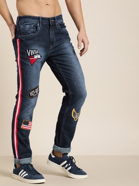 

Moda Rapido Men Blue Slim Fit Mid-Rise Clean Look Stretchable Jeans With Applique Detail