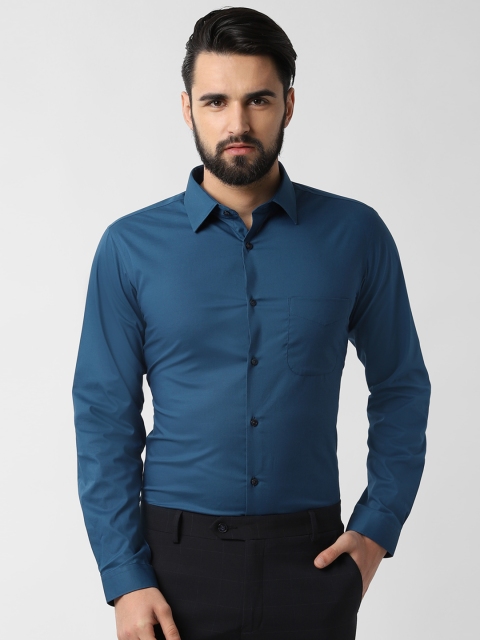 

Peter England Men Blue Slim Fit Solid Casual Shirt