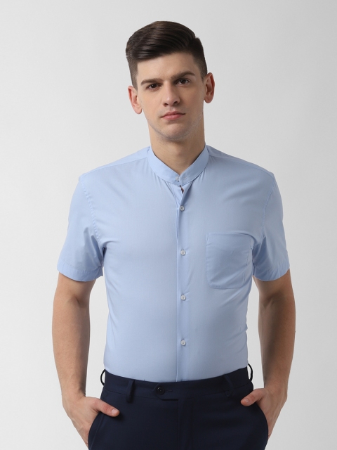 

Peter England Men Blue Slim Fit Solid Casual Shirt