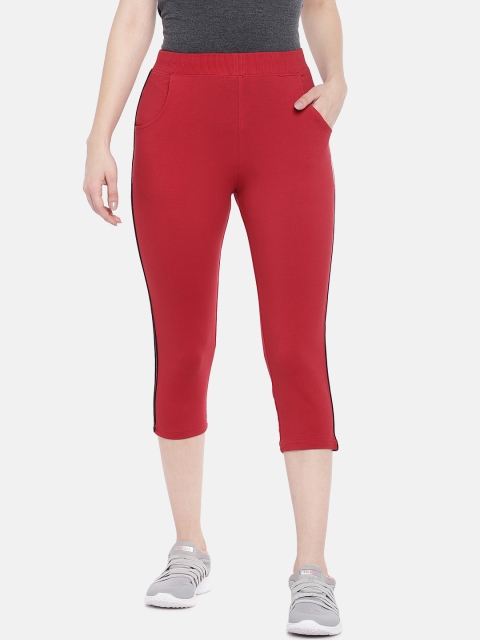 

Sweet Dreams Women Red Solid Slim Fit Capris