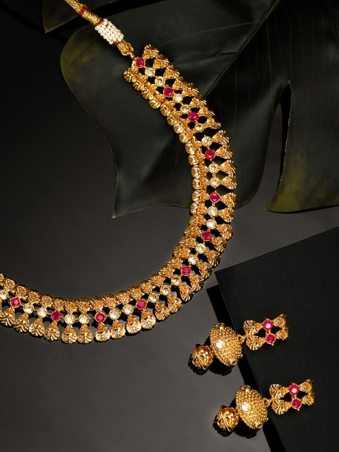 

Priyaasi Pink Antique Gold Plated Stone-Studded Leaf-Shaped Jewellery Set