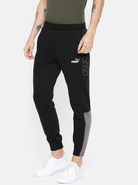 

Puma Men Black Solid Logo AOP Slim Fit Track Pants