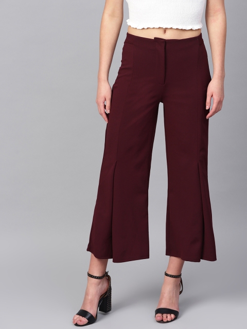 

Femella Women Burgundy Flared Solid Cropped Parallel Trousers