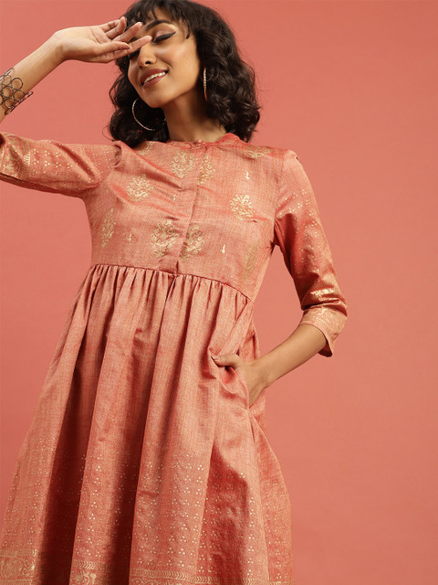 

Taavi Women Orange Hand Block Print Legacy A-Line Sustainable Kurta with Cut Out Back