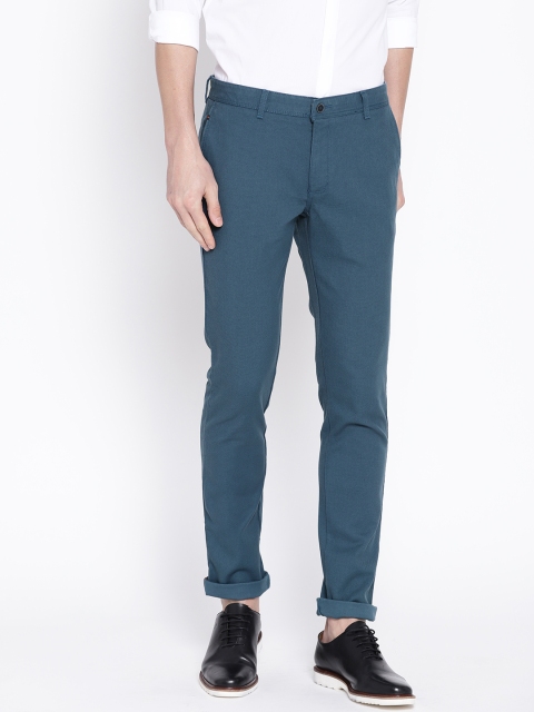 

Blackberrys Men Teal Blue Sharp Regular Fit Self Design Chinos