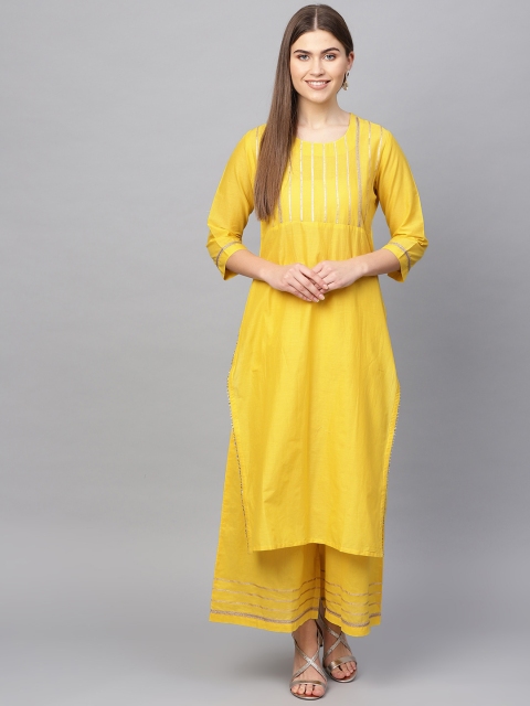 

Tulsattva Women Yellow Yoke Design Kurta with Palazzos