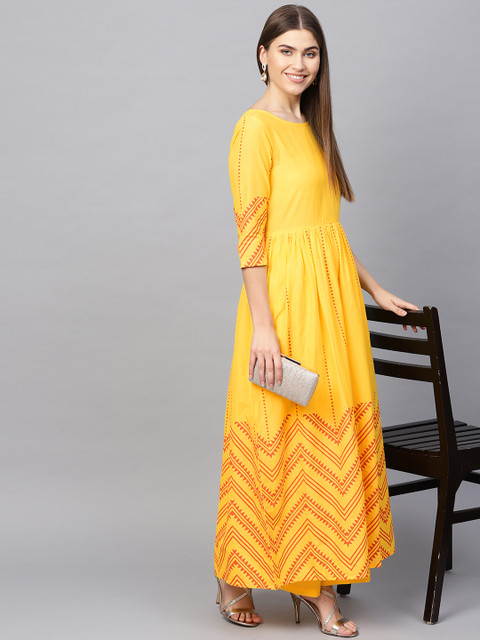 

Tulsattva Women Yellow & Orange Printed Kurta & Palazzos