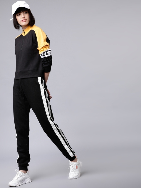 

Tokyo Talkies Women Black & Mustard Solid Sweatshirt