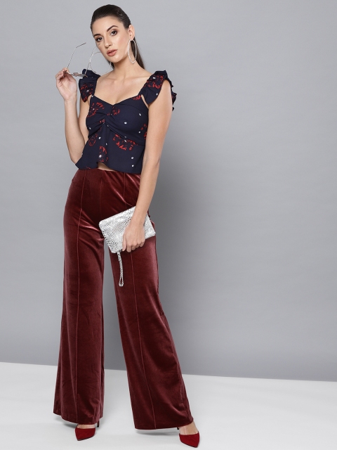 

Trend Arrest Women Navy Blue & Orange Printed Cropped Empire Top