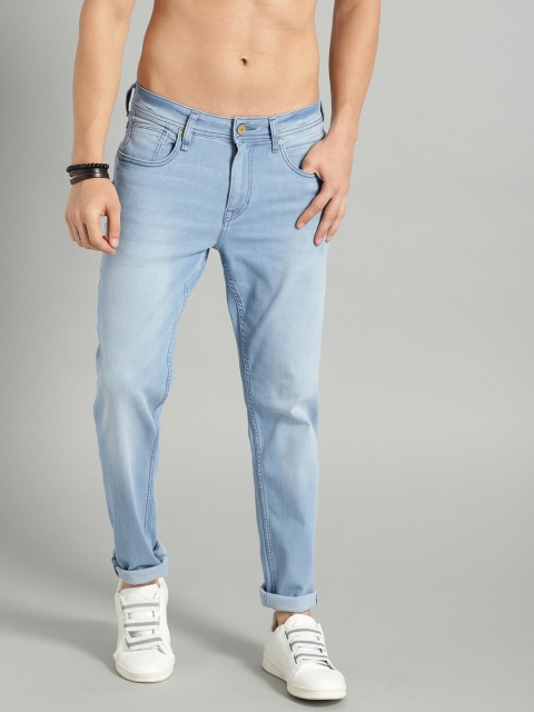 

The Roadster Lifestyle Co Men Blue Tapered Slim Fit Mid-Rise Clean Look Stretchable Jeans