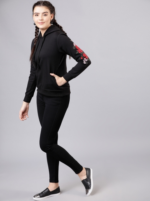 

Tokyo Talkies Women Black Solid Hooded Sweatshirt