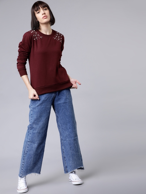 

Tokyo Talkies Women Burgundy Solid Sweatshirt
