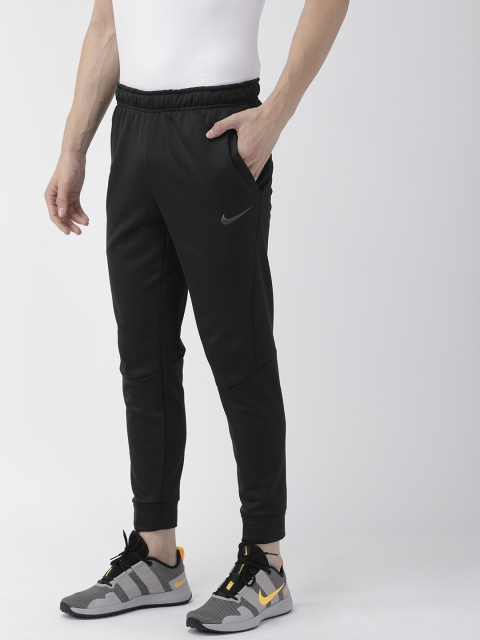 

Nike Men Black Solid AS THRMA NFS Taper Fit Dri-Fit Cropped Joggers