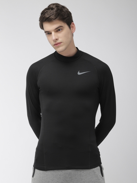 

Nike Men Black Solid Slim Fit AS M NP THRMA TOP LS Dri-Fit Round Neck Training T-shirt