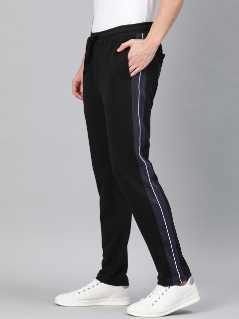 

Mast & Harbour Men Black Solid Straight Fit Track Pants With Side Straps
