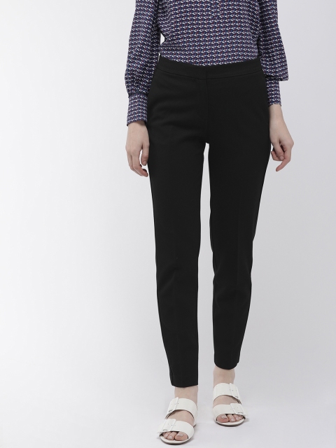 

Tommy Hilfiger Women Black Slim Fit Solid Regular Trousers